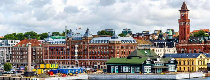 Colourful yellow, teal and brick buildings in the Swedish city of Helsingborg.