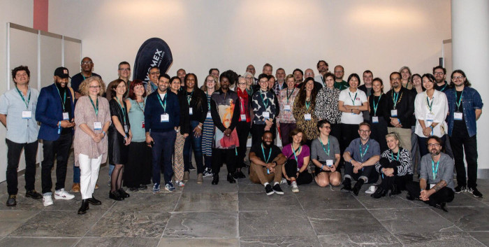 Group shot of around 40 people at the Cultural and Artist Mobility Advocacy Summit.