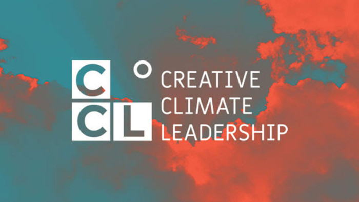 Creative Climate Leadership logo on a background of a sky at sunset, clouds coloured an almost neon orange.