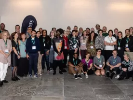 Group shot of around 40 people at the Cultural and Artist Mobility Advocacy Summit.
