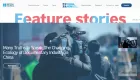 China Now! website. 'Feature stories' title over shot from behind of a man with a pro shoulder-mounted film camera. 