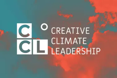 Creative Climate Leadership logo on a background of a sky at sunset, clouds coloured an almost neon orange.